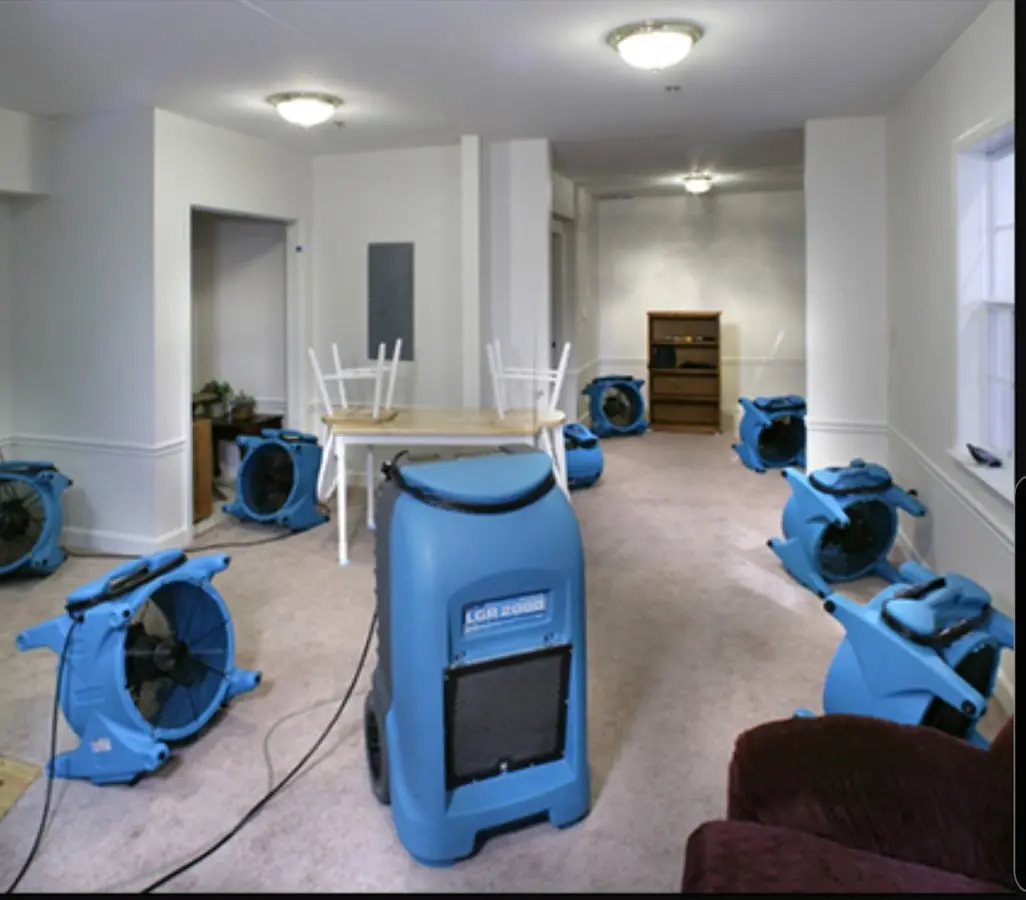 Air movers and dehumidifier setup for Water Damage Restoration in Riverdale